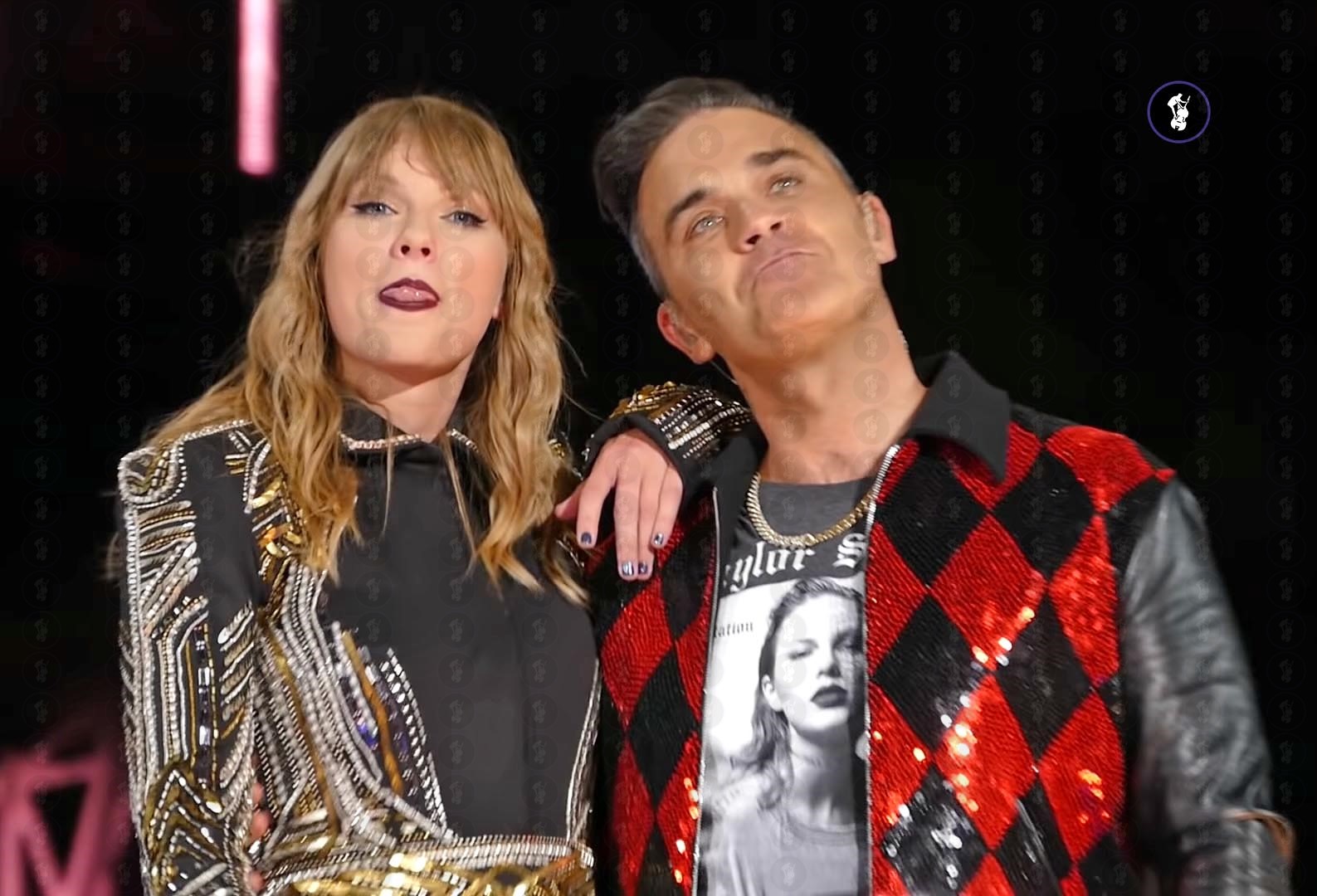 Robbie Williams & Taylor Swift have major chemistry on “Angels” live at Wembley The Music Man