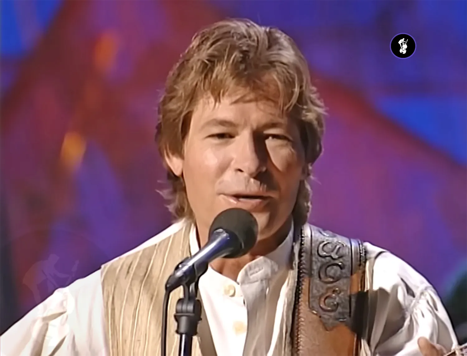 John Denver’s legacy-redeeming classic track Country Roads leads down