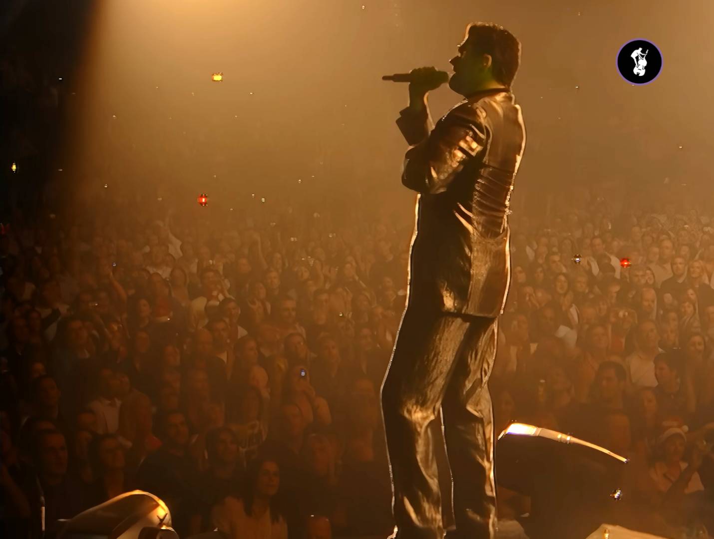 George Michael mesmerises Wembley with festive flashback performance of ...