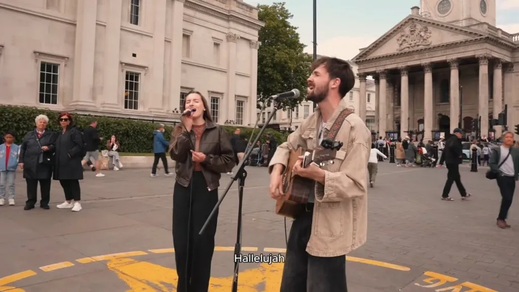 When Atticus Blue Invited London Powerhouse Amber To Duet On “Hallelujah” In This Viral Acoustic Street Performance, What She Did Next Stopped Shoppers In The Busy Square In Their